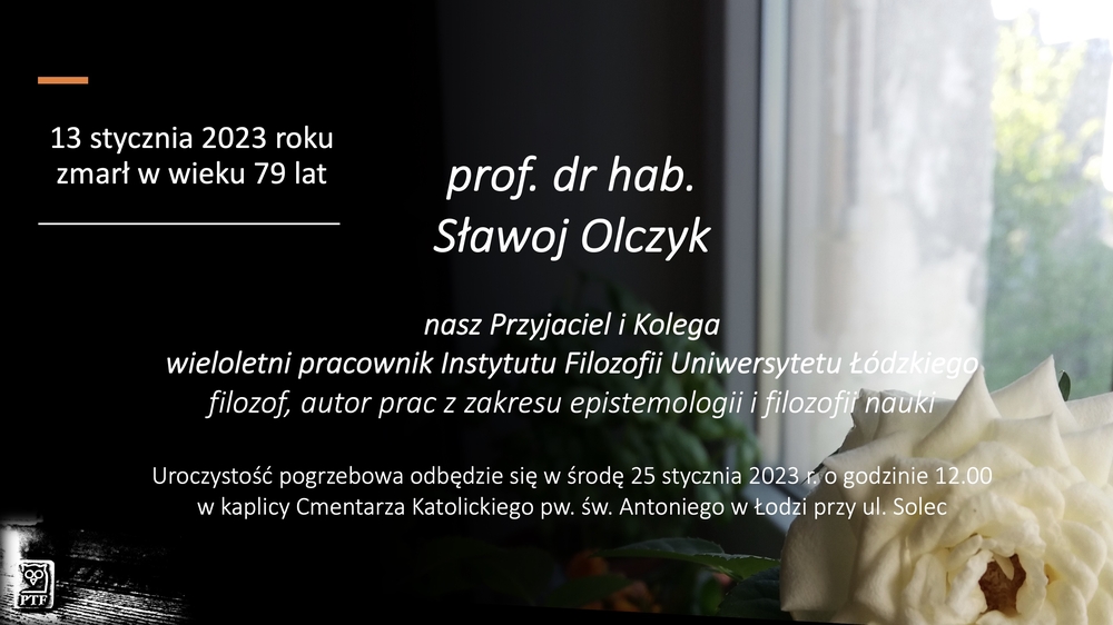 napis, w tle biały kwiat, okno