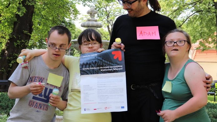 A photo of Dr Adam Drozdowski with the project participants